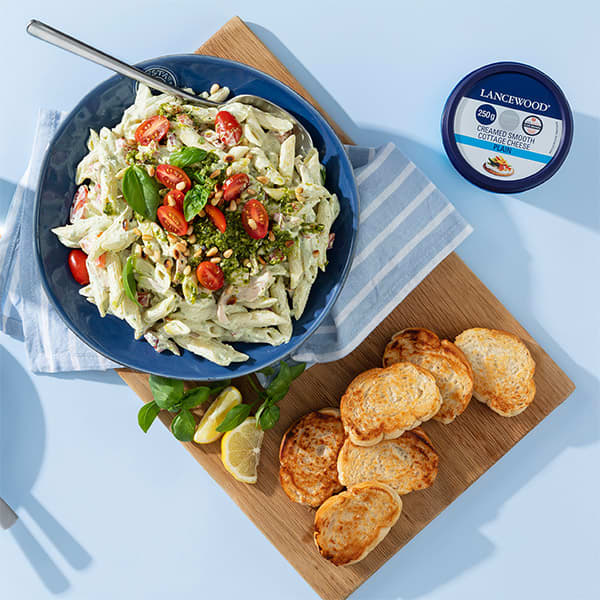 Creamy chicken pesto pasta salad with LANCEWOOD® cottage cheese, a tasty high-protein option for lunch box ideas