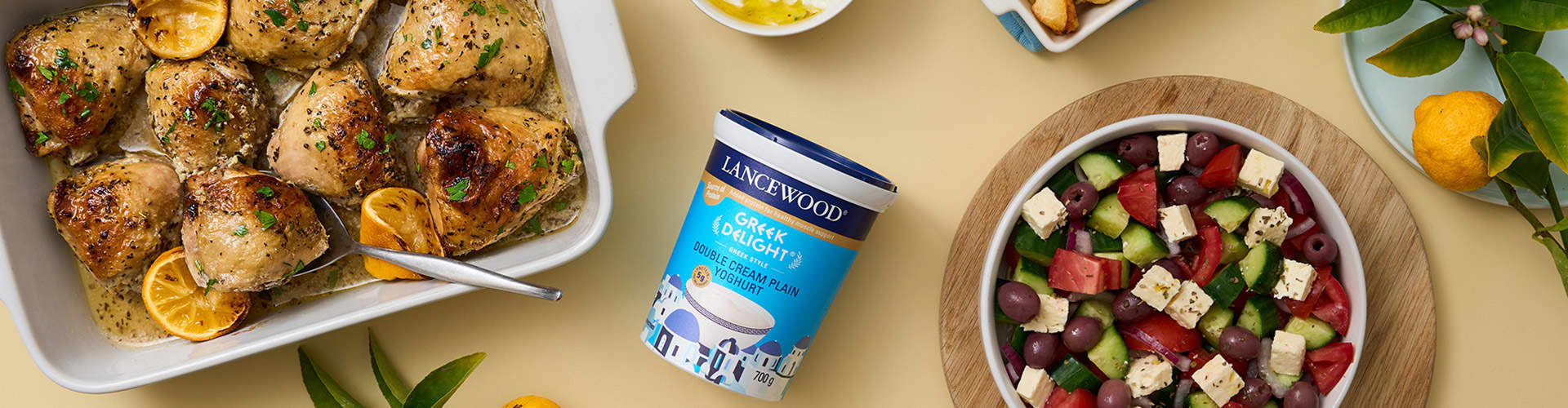 Juicy oven-baked Greek Lemon Chicken served with homemade tzatziki and salad, a Greek Yoghurt South Africa favourite. 