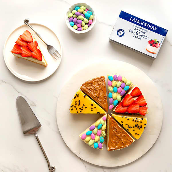 Easy no bake cheesecake recipe with four flavours – strawberry, caramel, passionfruit and candy toppings.