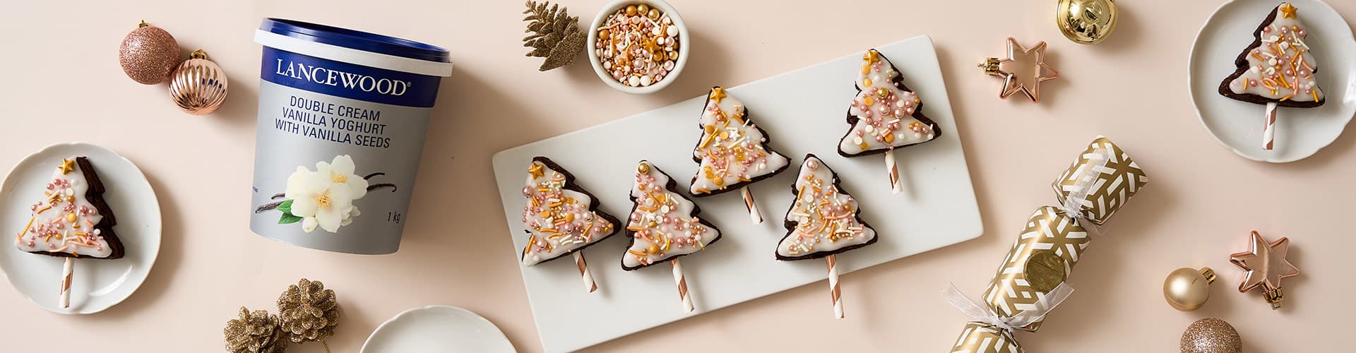 Christmas Tree Brownies decorated with vanilla double cream yoghurt glaze