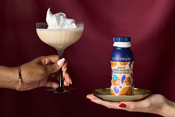 Vanilla-Amaretto Cream Fizz cocktail made with LANCEWOOD® Low-Fat Vanilla Flavoured Drinking Yoghurt - a smooth, creamy festive drink with a hint of coffee liqueur.