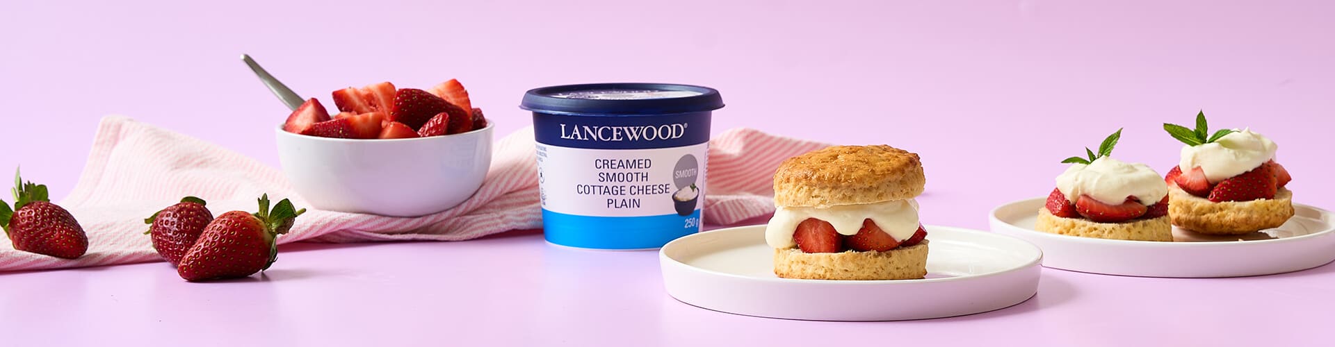 Easy strawberry shortcake dessert featuring cottage cheese biscuits, whipped cream and fresh strawberries. 