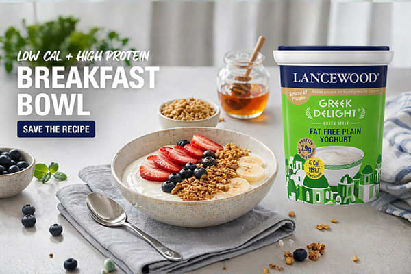 Breakfast bowls with yoghurt, strawberries, granola and honey served alongside Lancewood fat free greek delight yoghurt