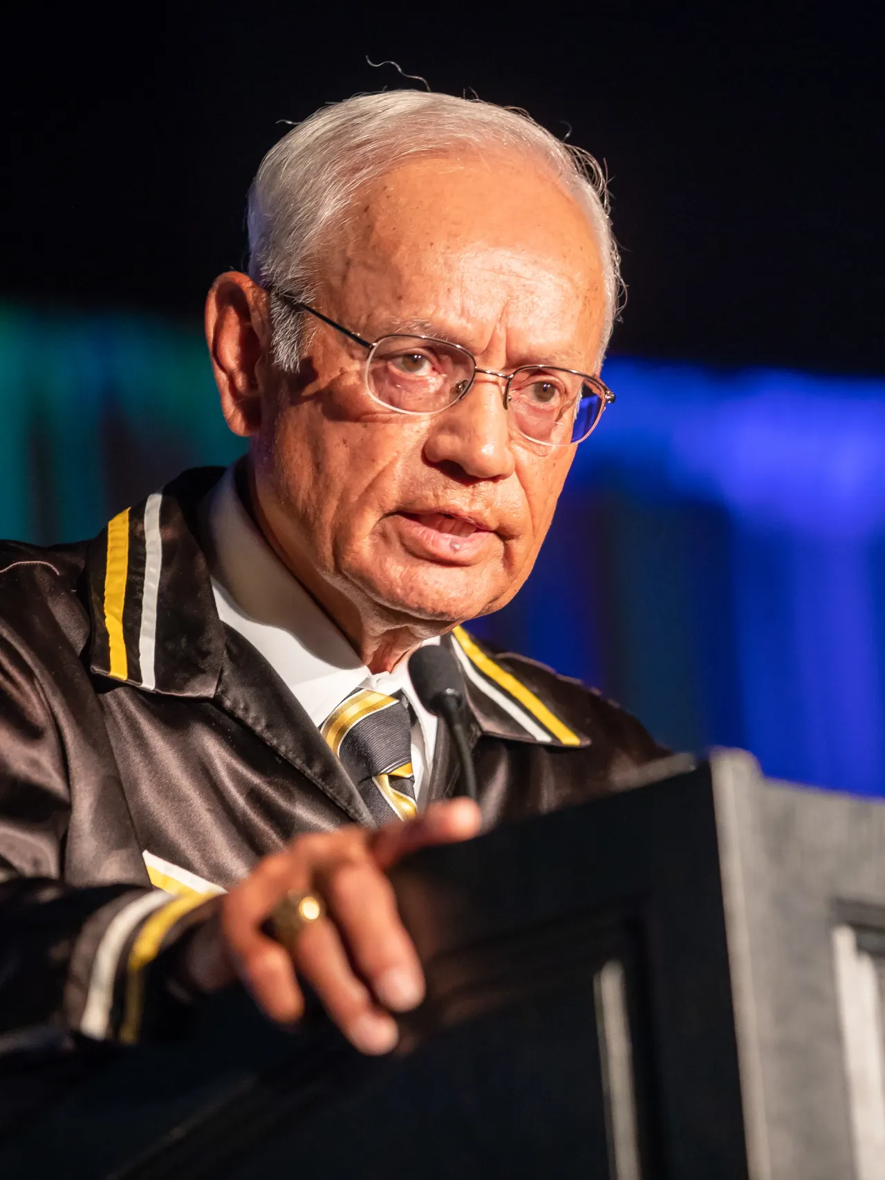 A man standing in front of a podium.