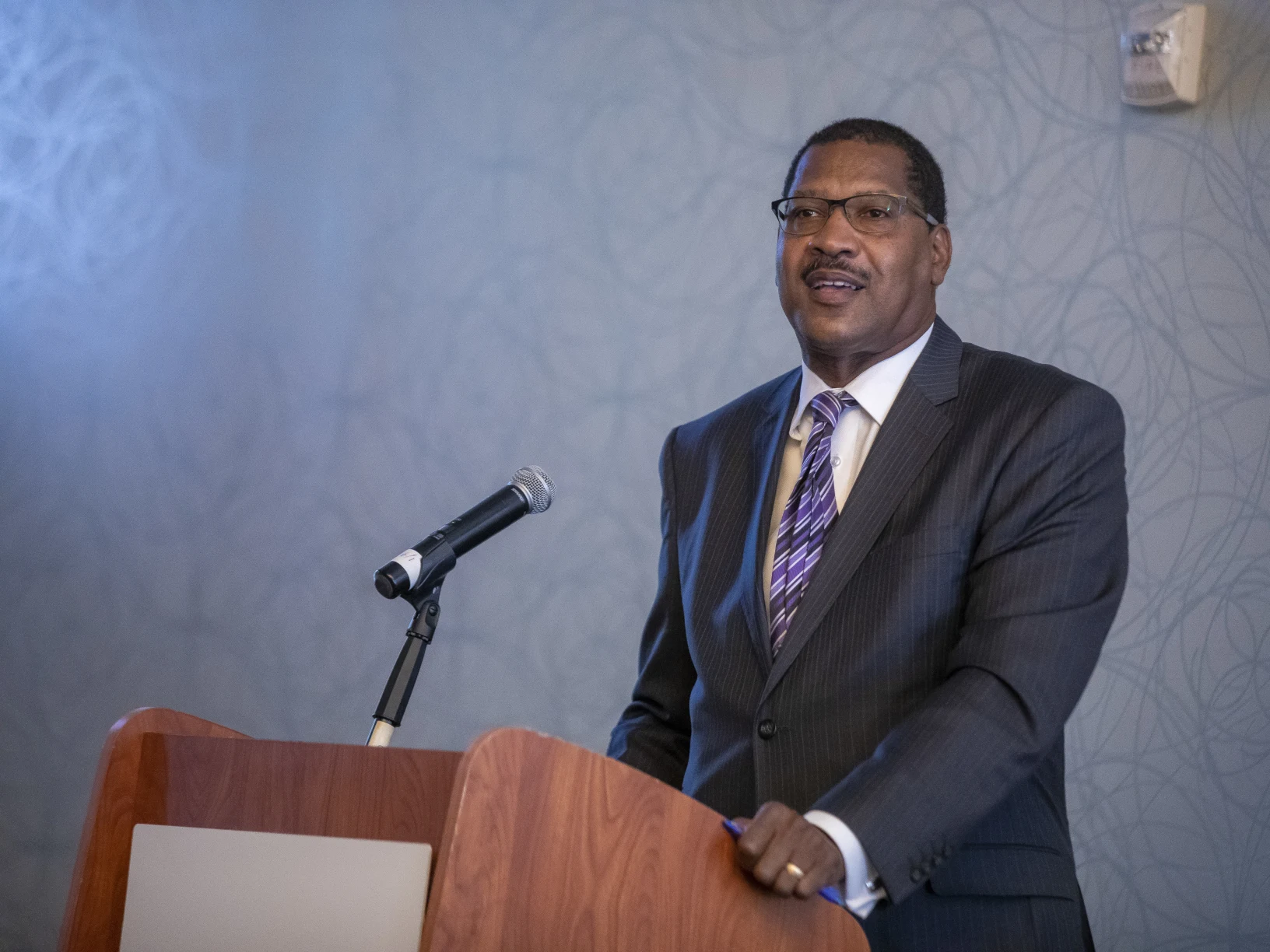 A man standing at a podium.