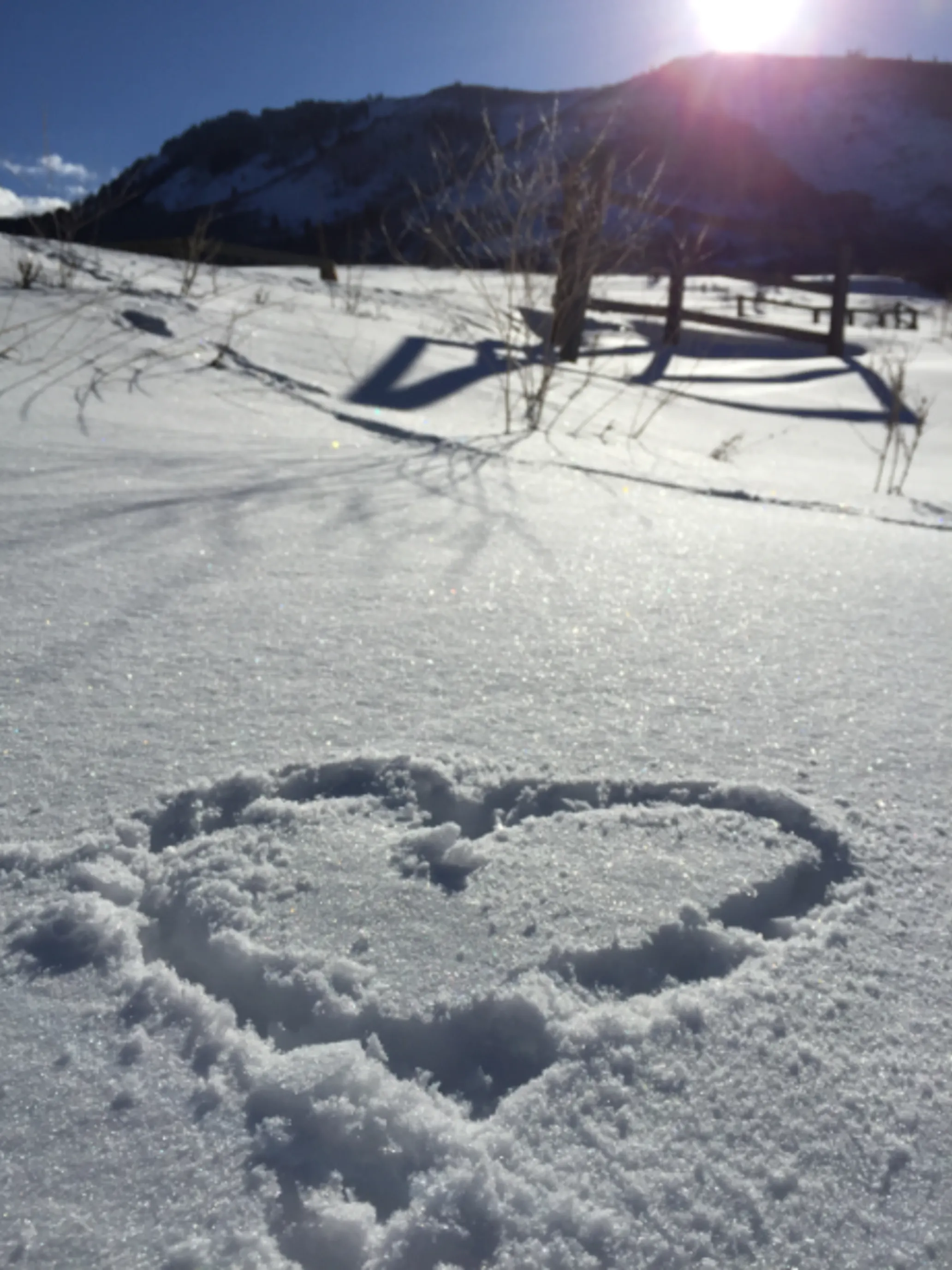 A heart is drawn in the snow