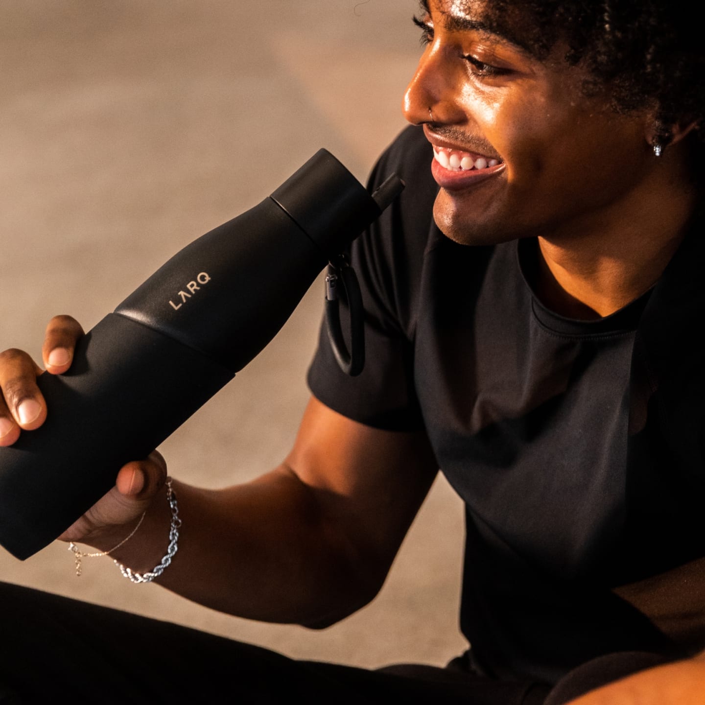 Man drinking water from LARQ Bottle Movement with LARQ Bottle Filtered Cap