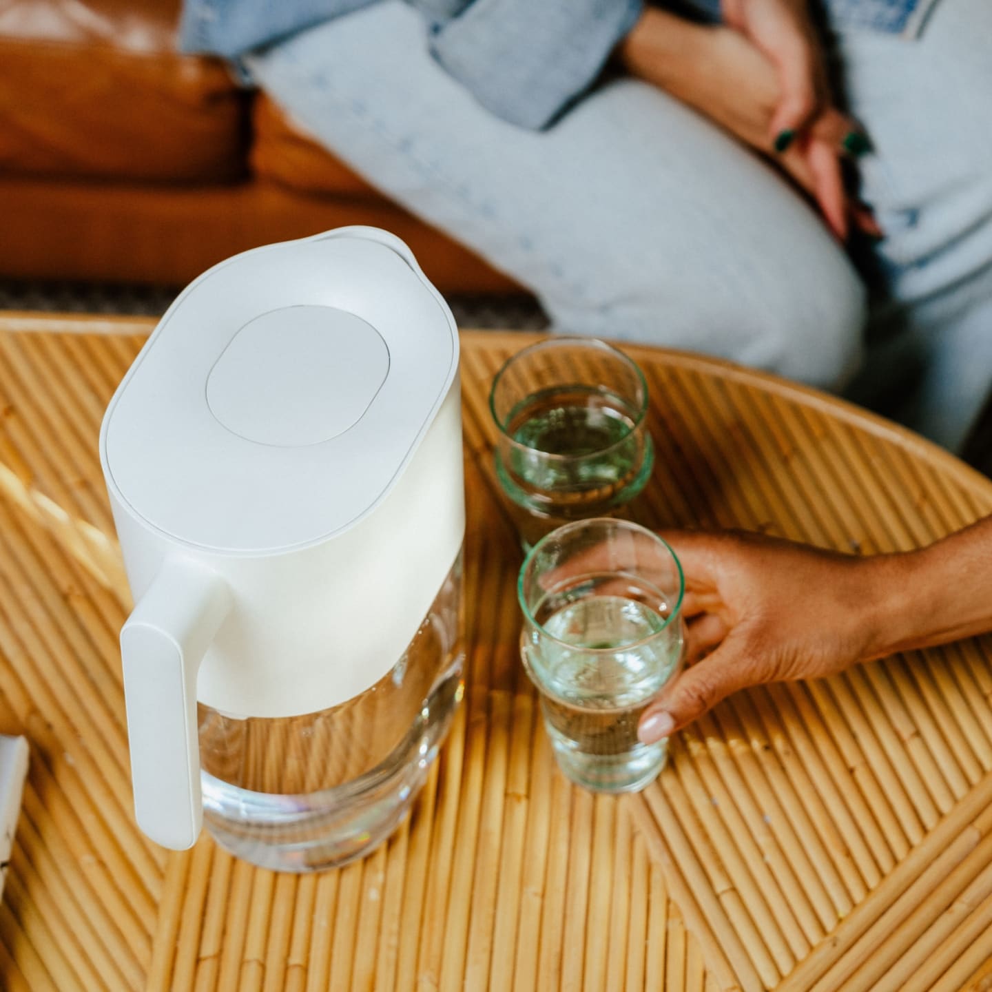 Man drinking water from Larq bottle swig top