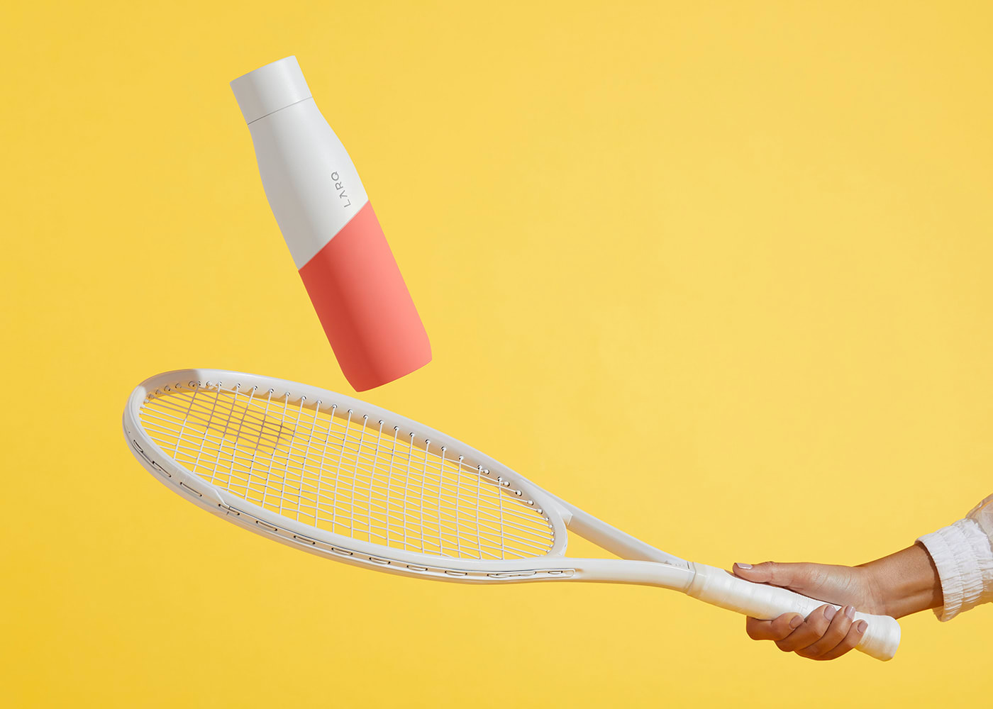 Larq bottle falling on the racket