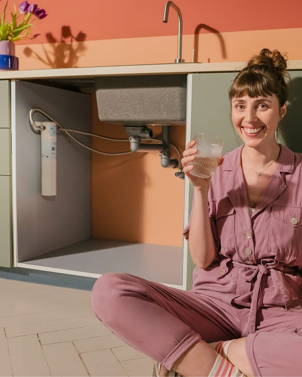 Person drinking fresh clean water