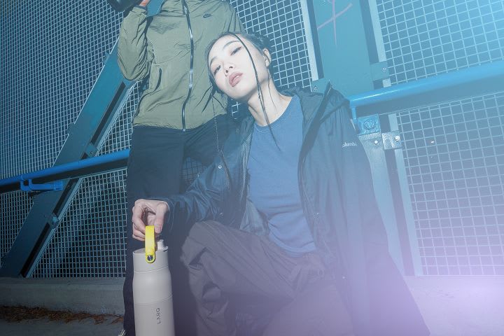 Woman holding a LARQ Bottle