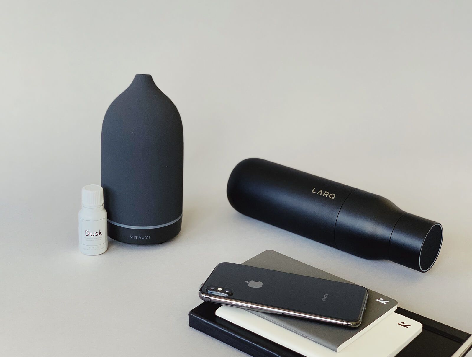 graduation gift ideas: LARQ Bottle, Vitruvi aromatherapy diffuser, Karst stone paper notebooks