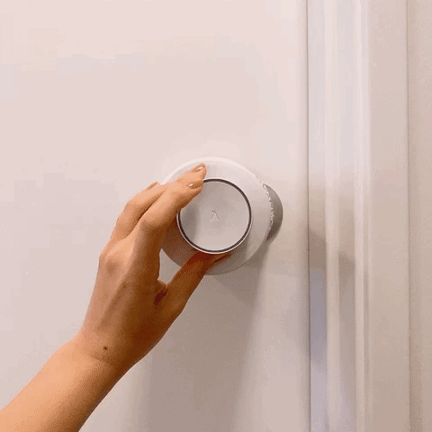 LARQ PureVis™ Bust-a-germ DIY used on a doorknob to sterilize and eradicate bacteria & viruses