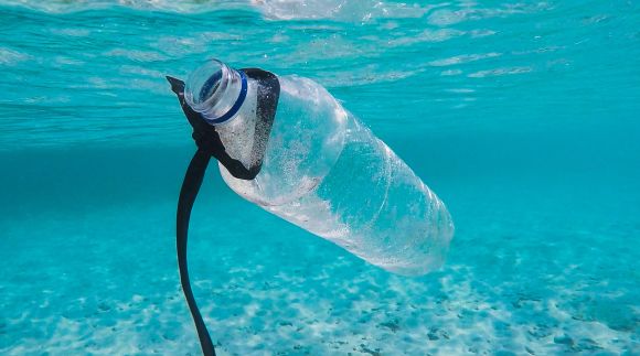 plastic bottle waste floating in the ocean