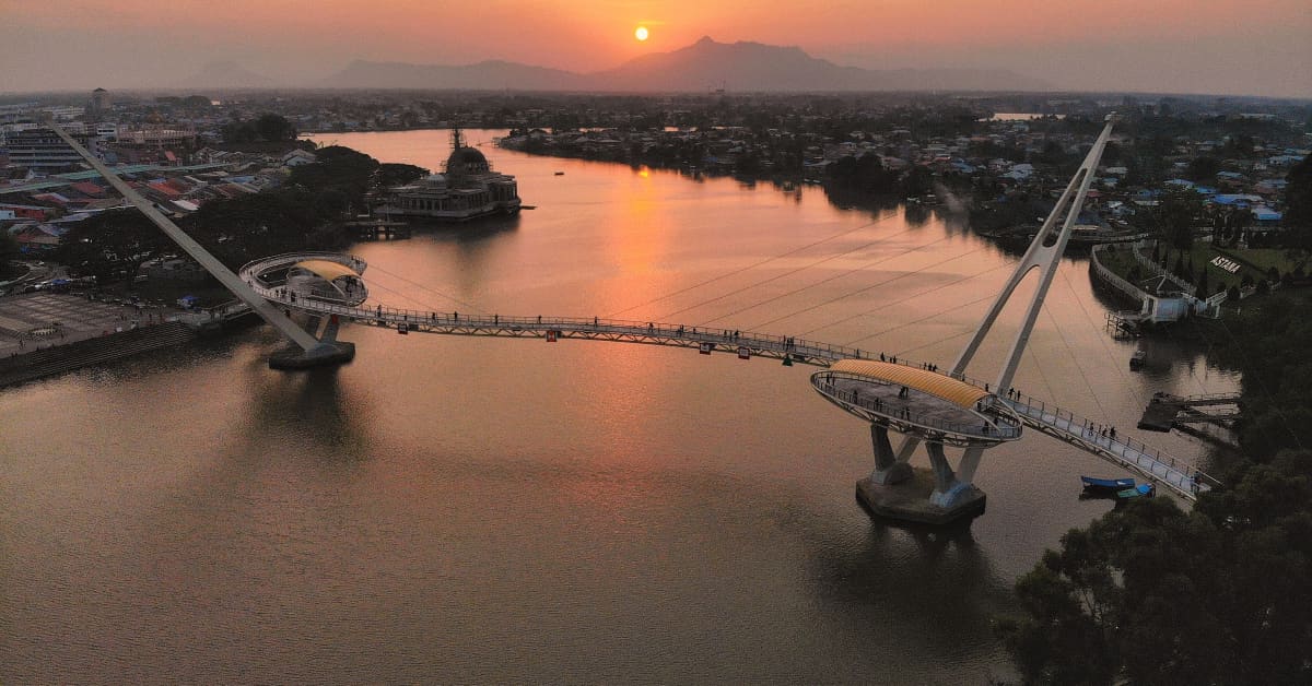 Manchester - Kuching Manchester - Kuching