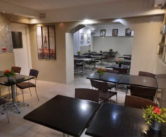 OYO Huttons Hotel