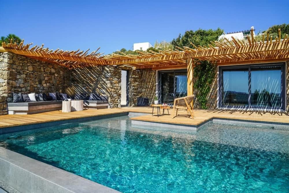 Paris - Mykonos Citá - Ikies of Mykonos