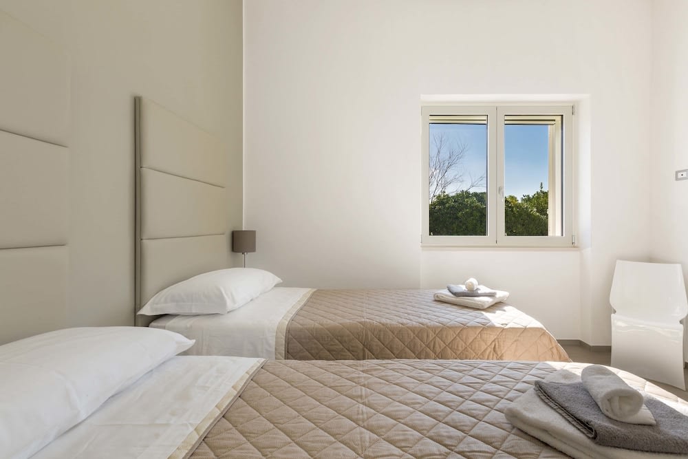 Stanze VILLA DEL CONTE a Punta Prosciutto by SalentoGo 4