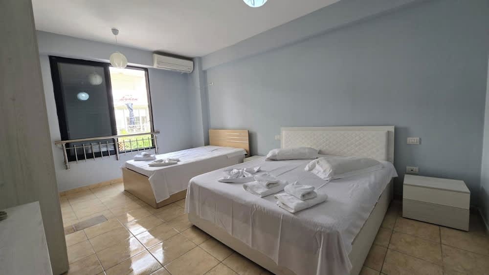 Tirent Apartment - Cozy Bedrooms Stay by Golem Beach. 1
