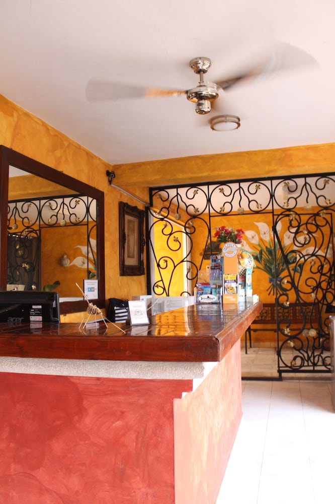 

Roma - Cozumel - Hotel La Casona Real