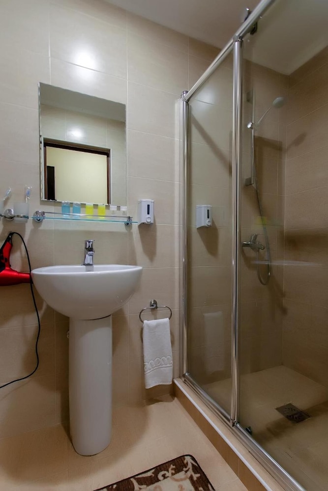 

Roma - Almaty - Hotel MILDOM Express
