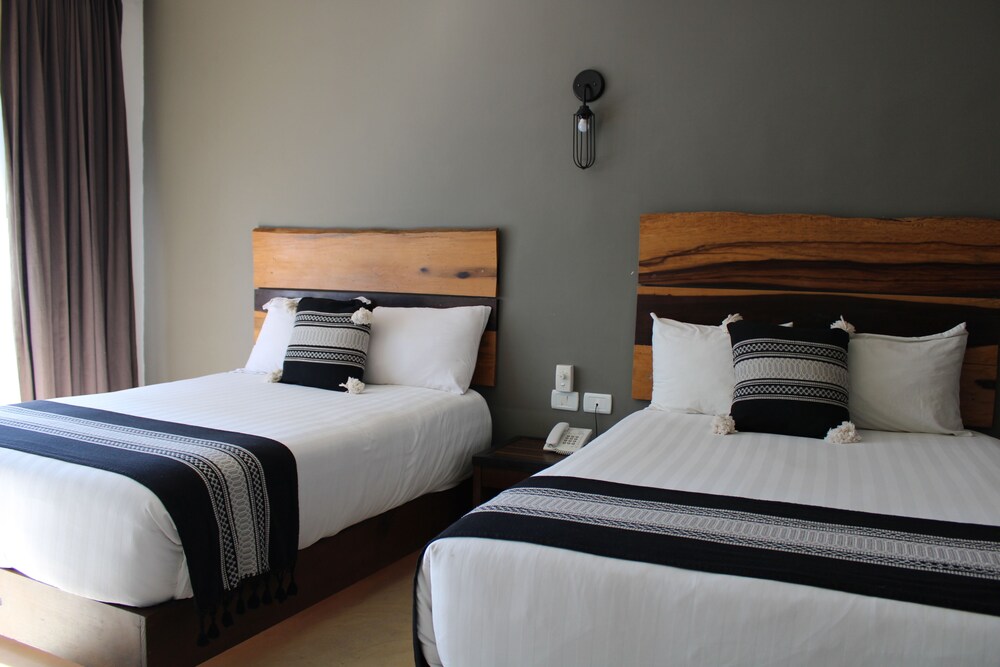 

Roma - Playa del Carmen - Hotel52