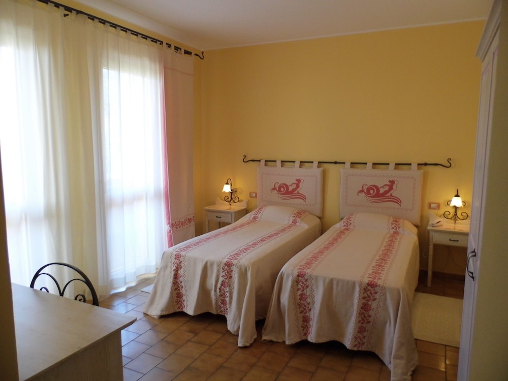 

Catania - La Maddalena - LE NEREIDI Hotel & Residence con Piscina-Tennis-Fitness-Parcheggio coperto-Sala Conferenze