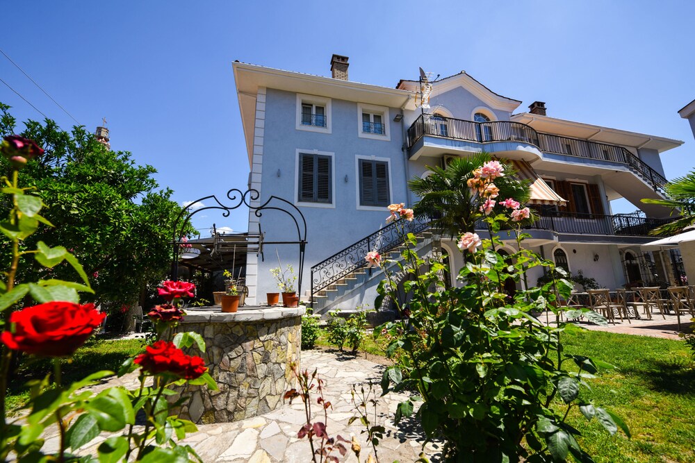 

Milano - Shkodër - Rose Garden Hotel