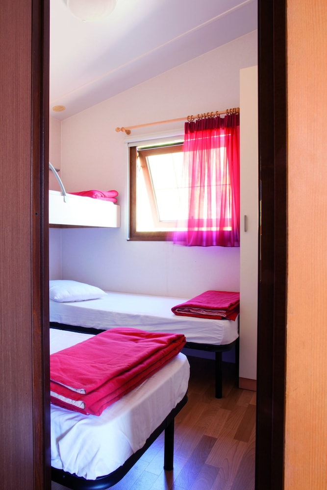 

Roma - Baja Sardinia - Camping Village Capo D'Orso