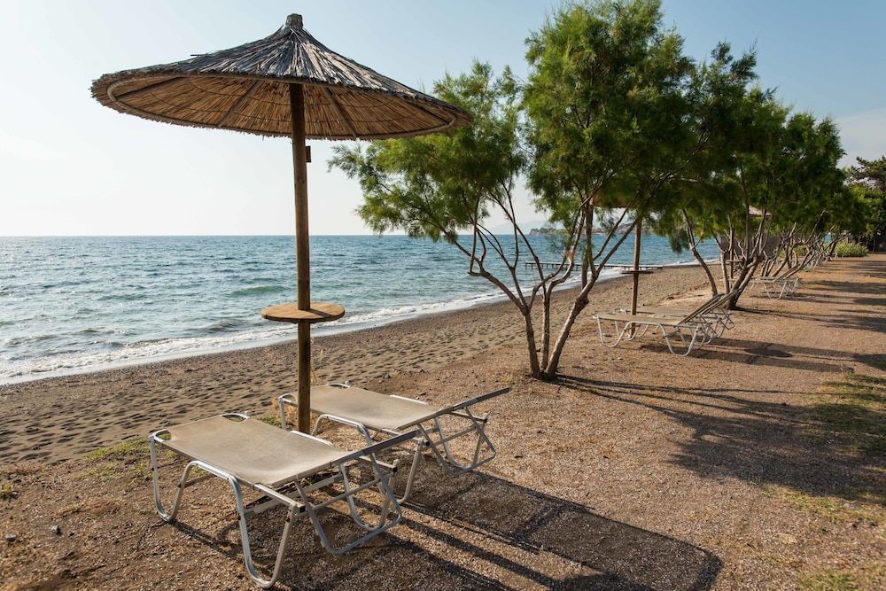 

Milano - Petra - Delfinia Hotel & Bungalows