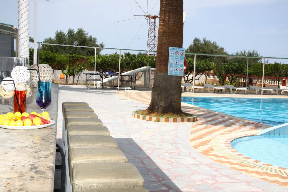 

Roma - Milatos - Triton Garden Hotel
