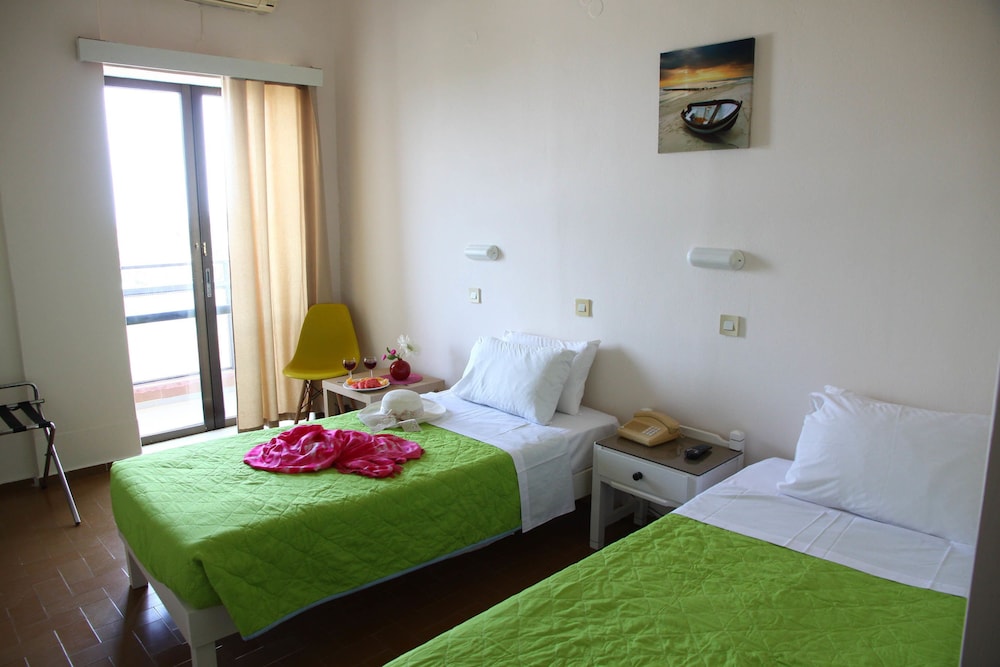 

Pisa - Milatos - Triton Garden Hotel