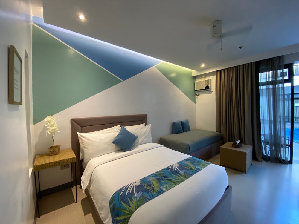 

Bologna - Puerto Princesa - White Breeze Palawan Boutique Hotel