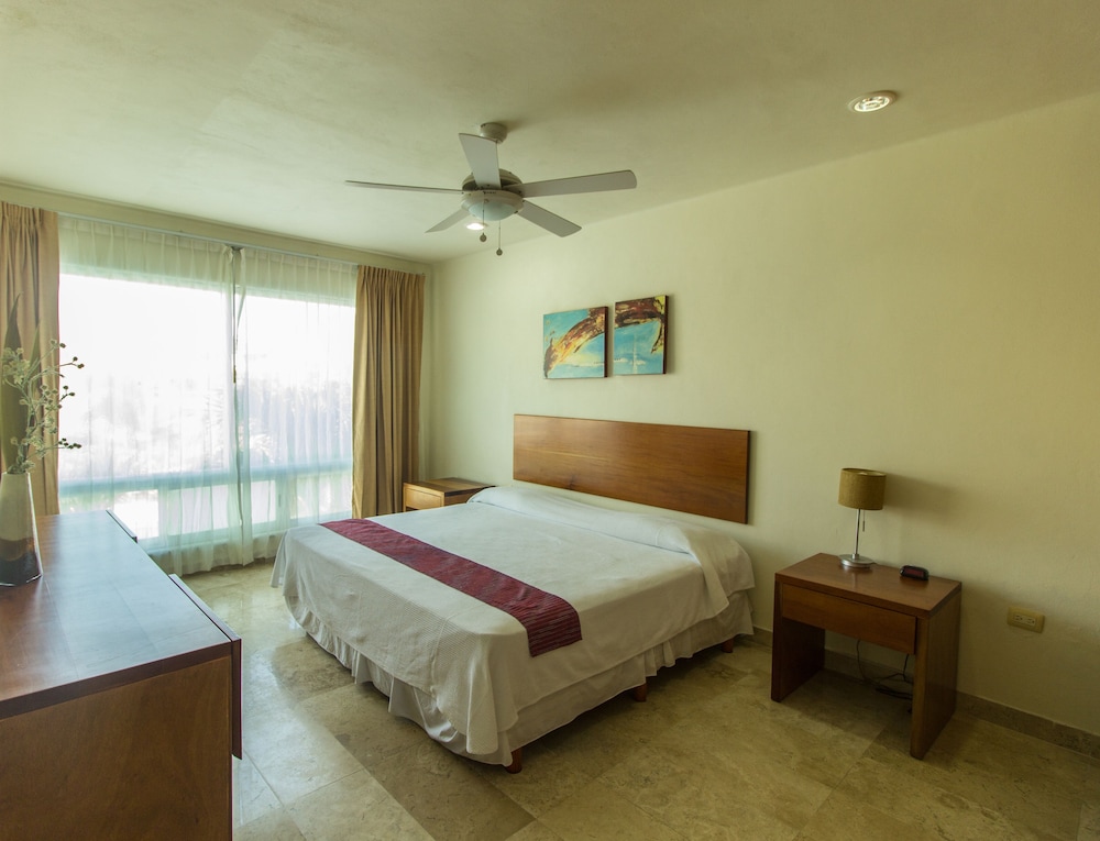 

Roma - Paamul - Coral Maya Stay Suites