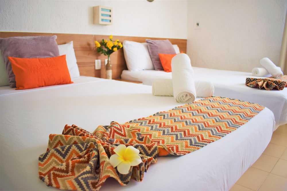 

Bologna - Puerto Morelos - Arrecifes Suites