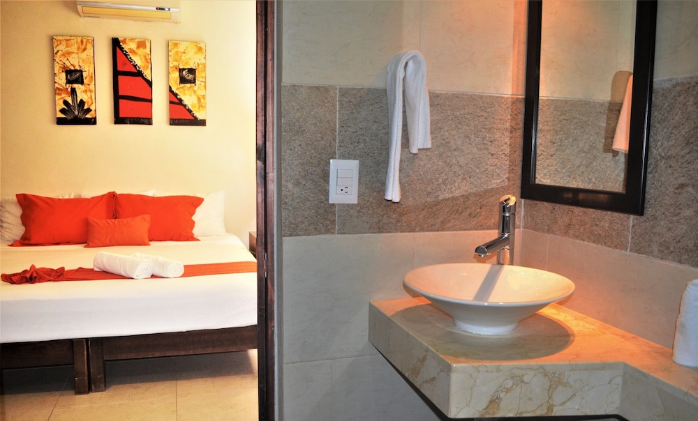 

Roma - Puerto Morelos - Arrecifes Suites