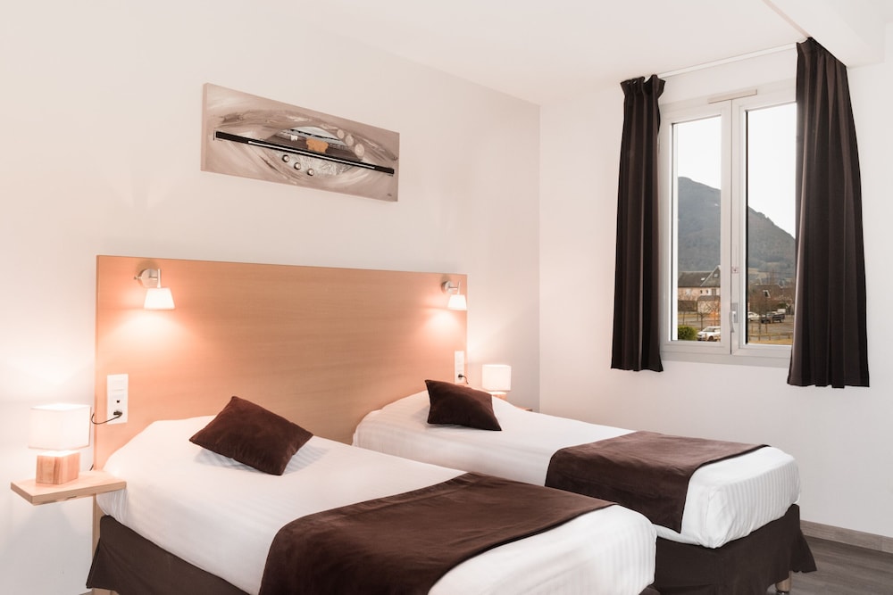 

Roma - Pouzac - Carré Py' Hôtel
