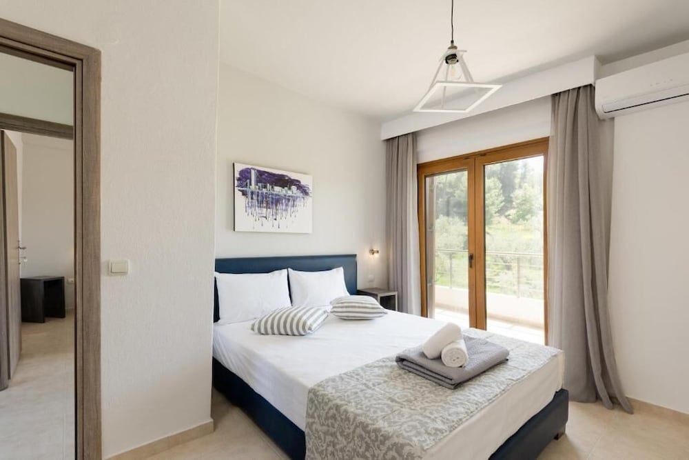

Milano - Sani Beach - Elani Elaia Villas