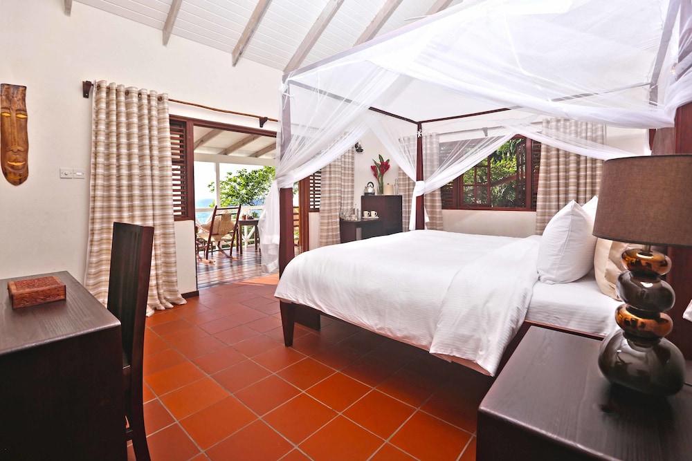 

Bologna - Soufriere - Ti Kaye Resort & Spa - Adults Only