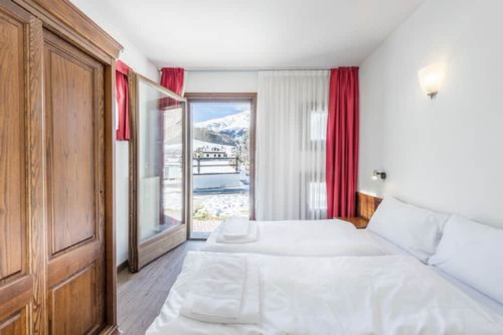 

Catania - Livigno - Residence Nevegall