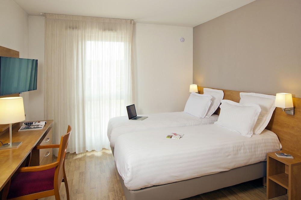 

Roma - Angers - Séjours & Affaires Angers Atrium
