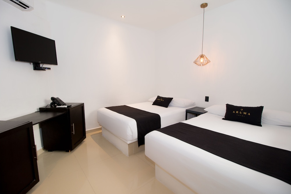 

Bari - Playa del Carmen - Aruma Hotel