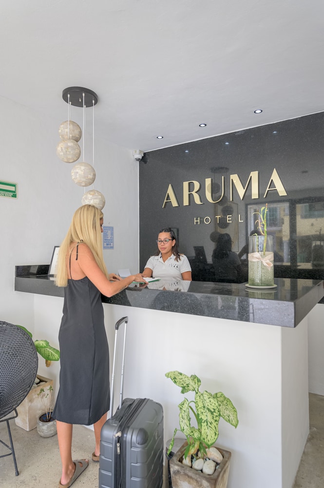 

Catania - Playa del Carmen - Aruma Hotel