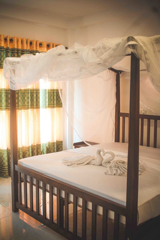 

Roma - Weligama - Tanoaks Villa