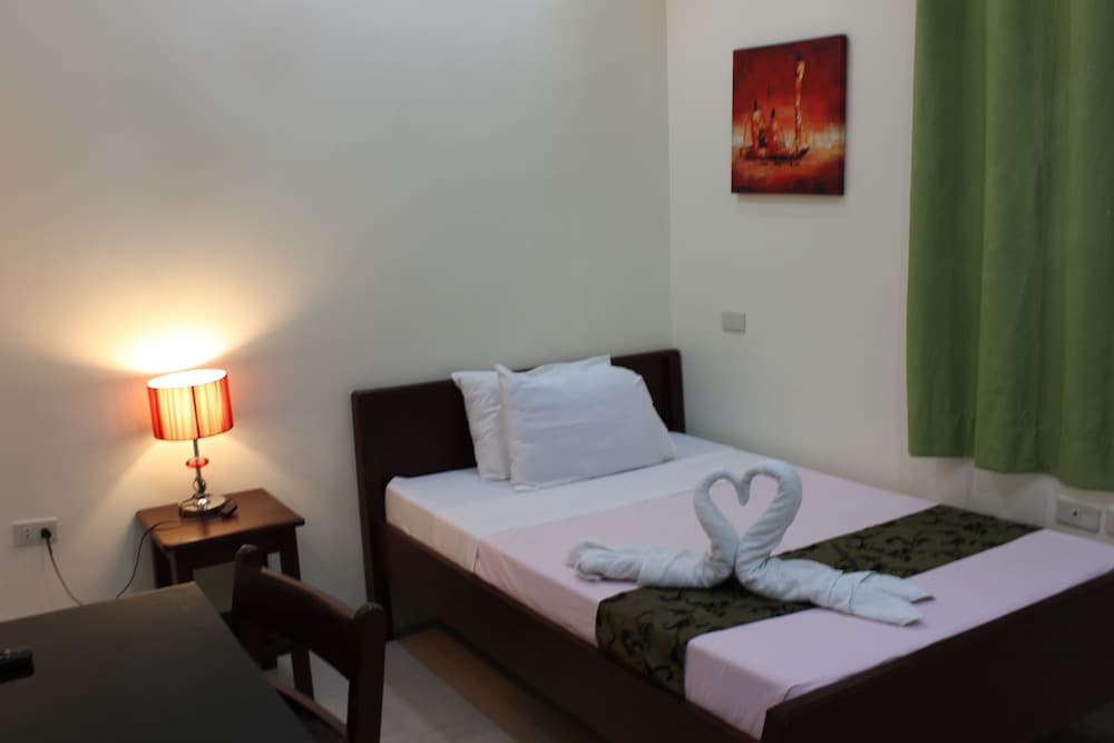 

Roma - Puerto Princesa - Blue Lagoon Inn & Suites
