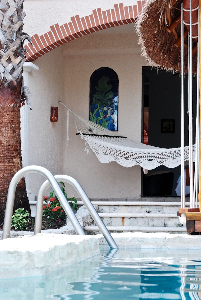 

Roma - Akumal - Chez Waffle Hotel