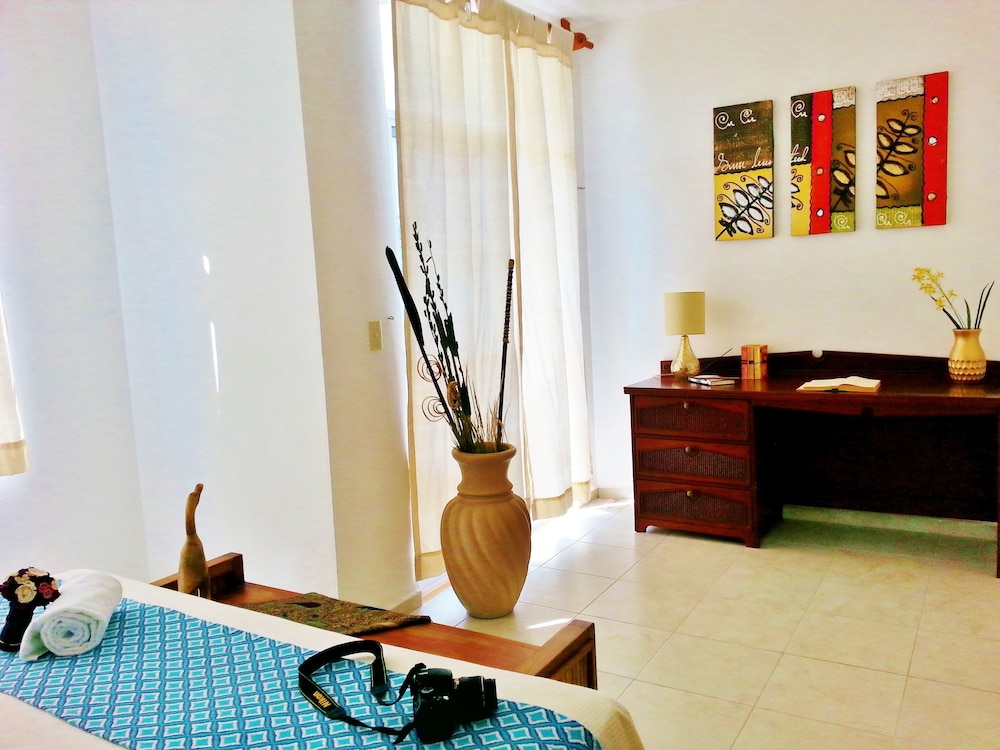 

Milano - Puerto Morelos - Corales Suites