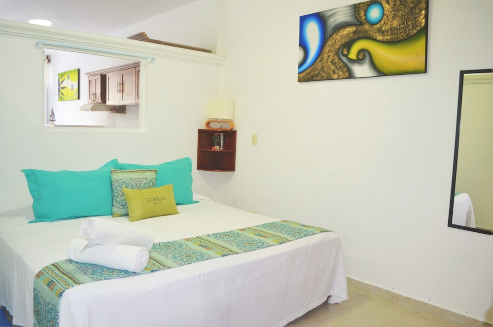 

Roma - Puerto Morelos - Corales Suites