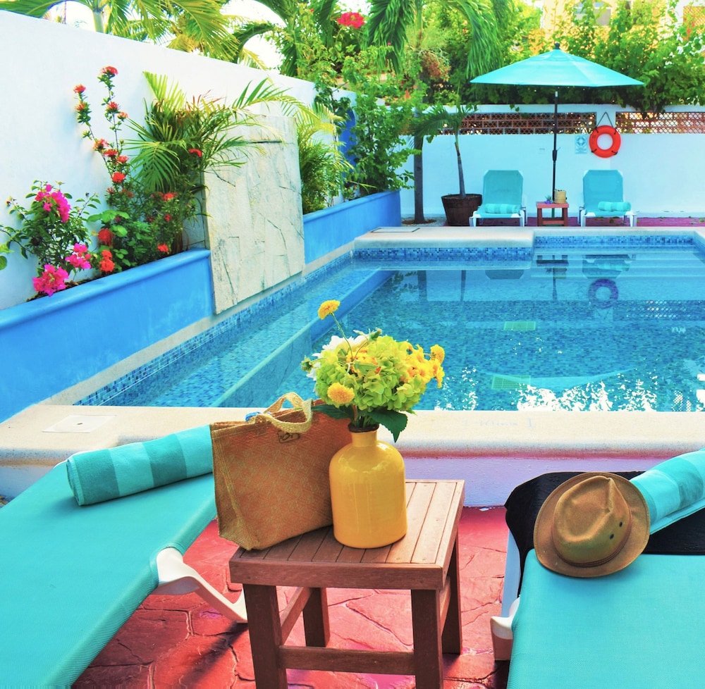 

Catania - Puerto Morelos - Corales Suites