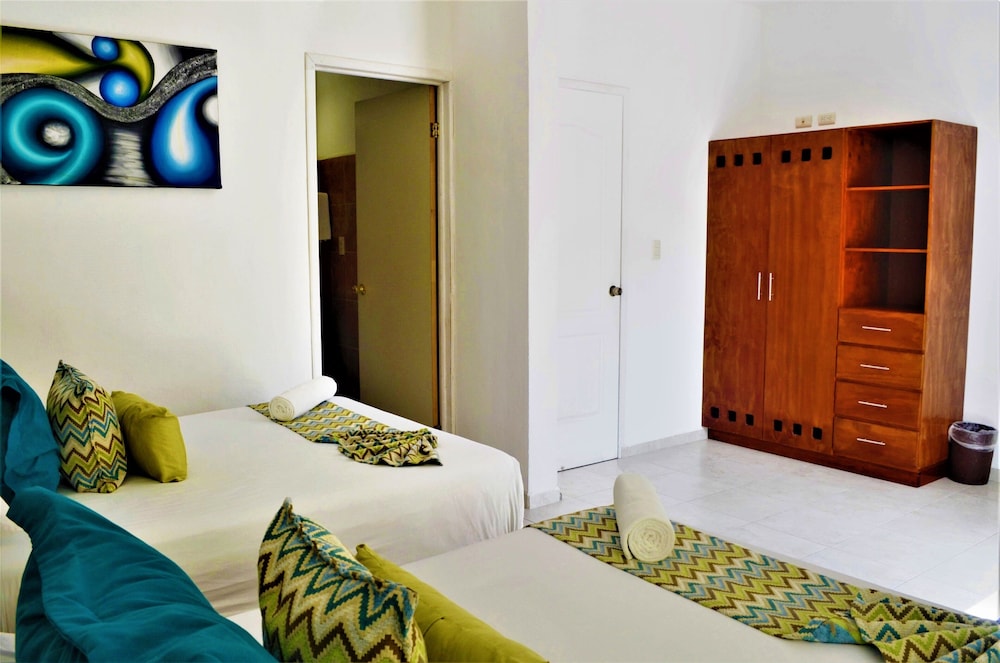 

Catania - Puerto Morelos - Corales Suites